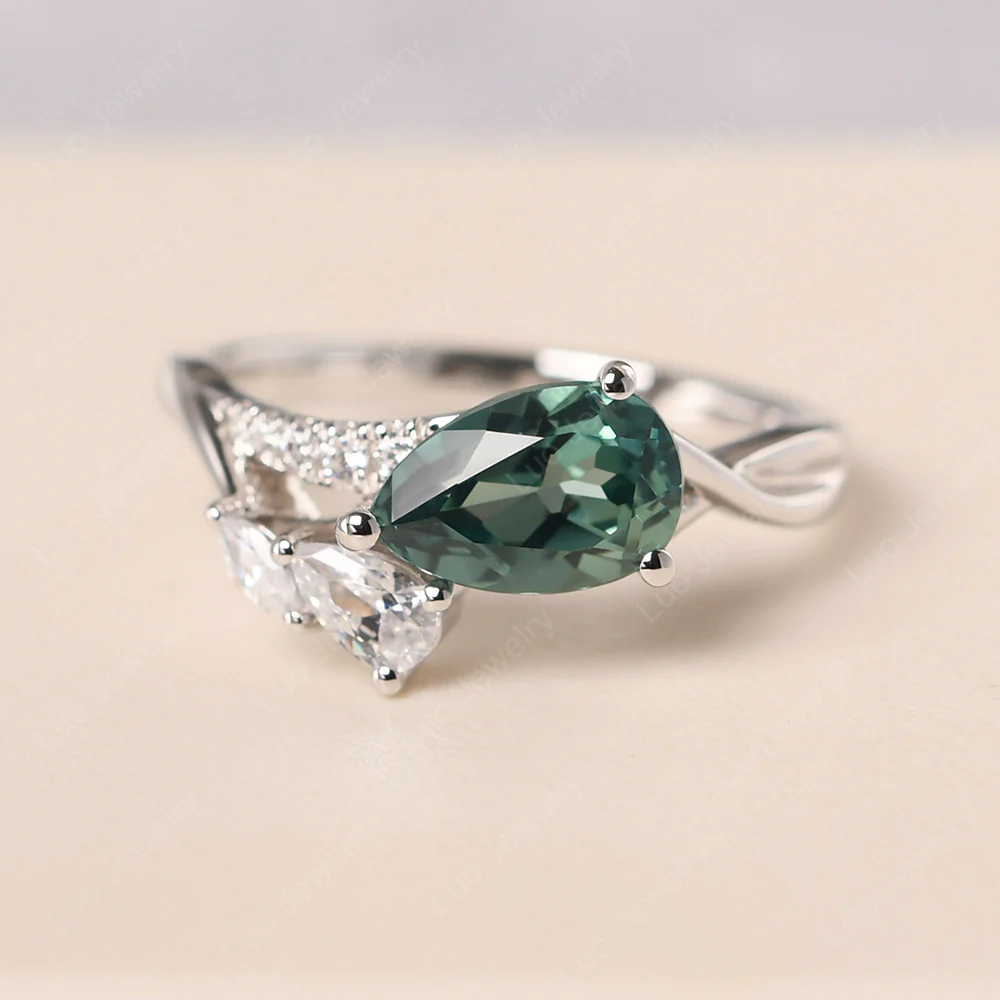 Pear Shaped Horizontal Green Sapphire Ring - Image 2