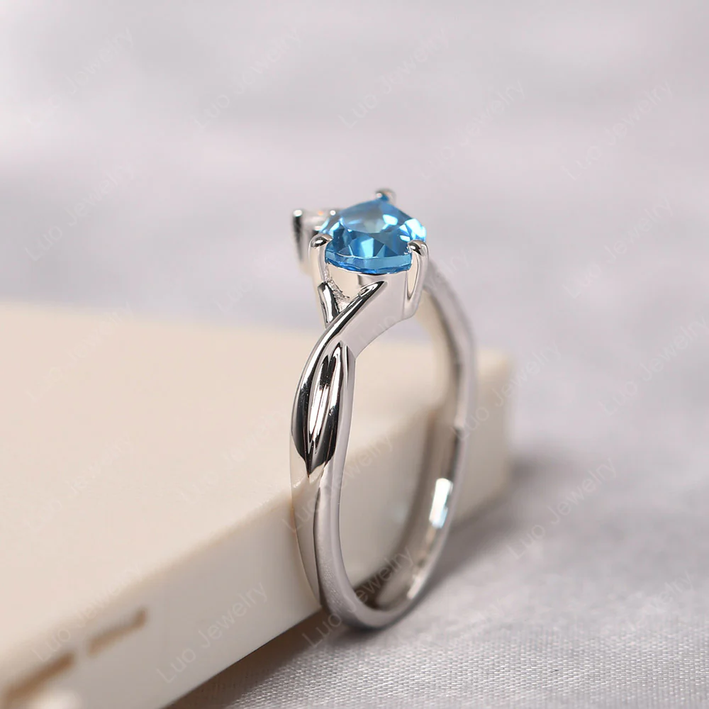 Pear Shaped Horizontal Swiss Blue Topaz Ring - Image 4