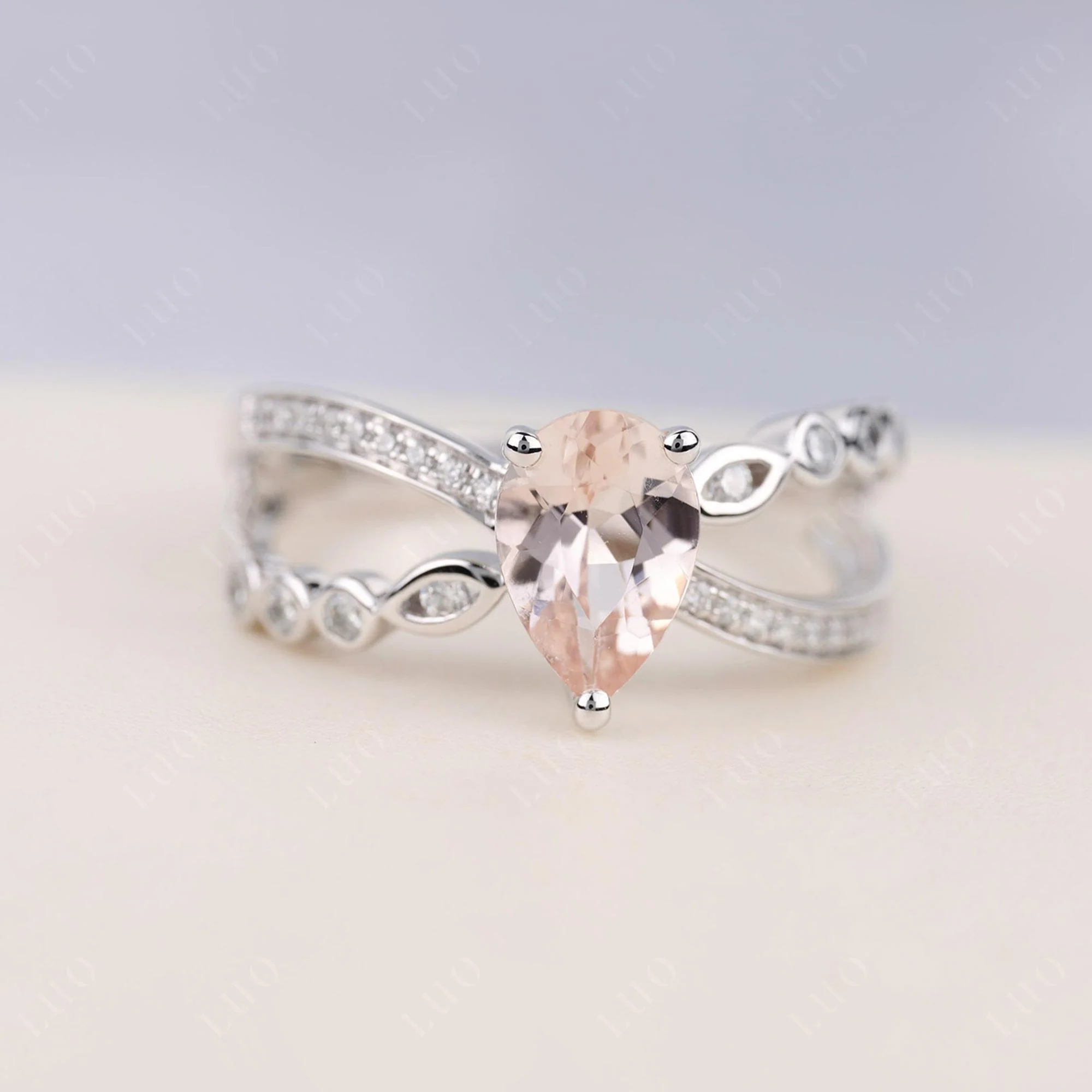 Pear Shaped Morganite Crossover Ring