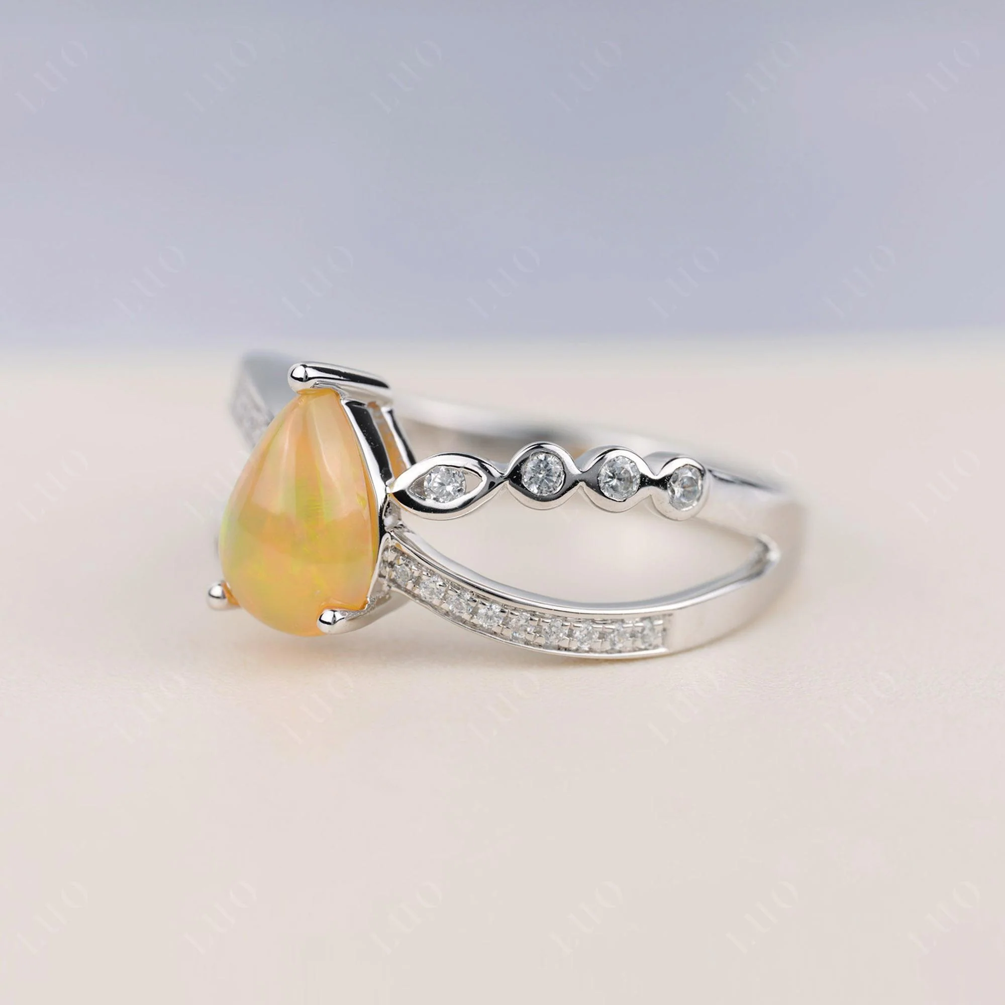 Pear Shaped Opal Crossover Ring - Image 2