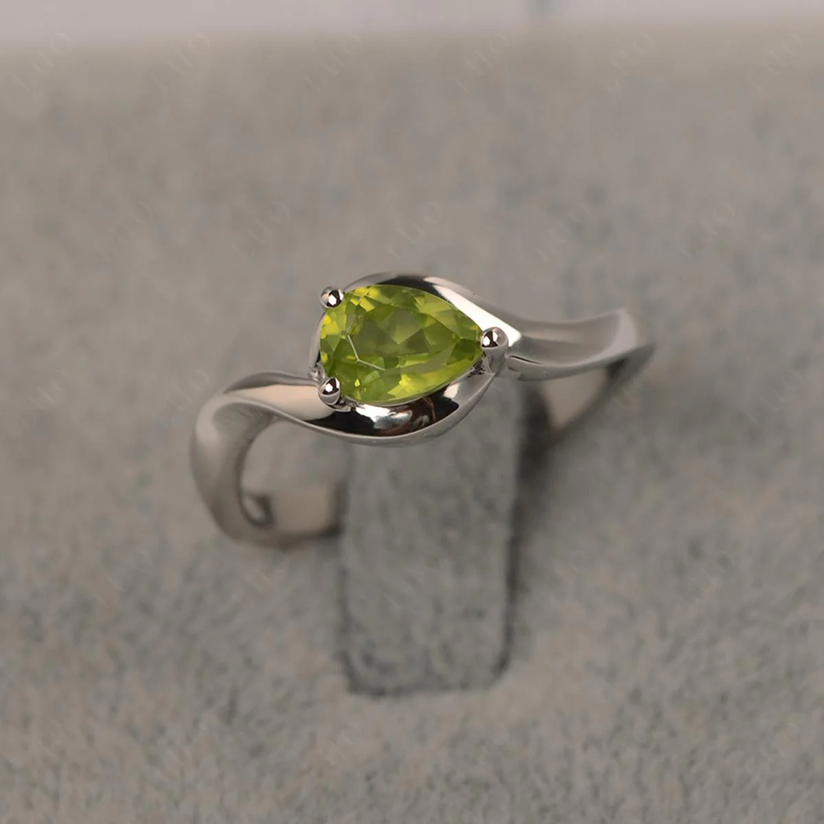 Pear Shaped Peridot East West Solitaire Ring - Image 10