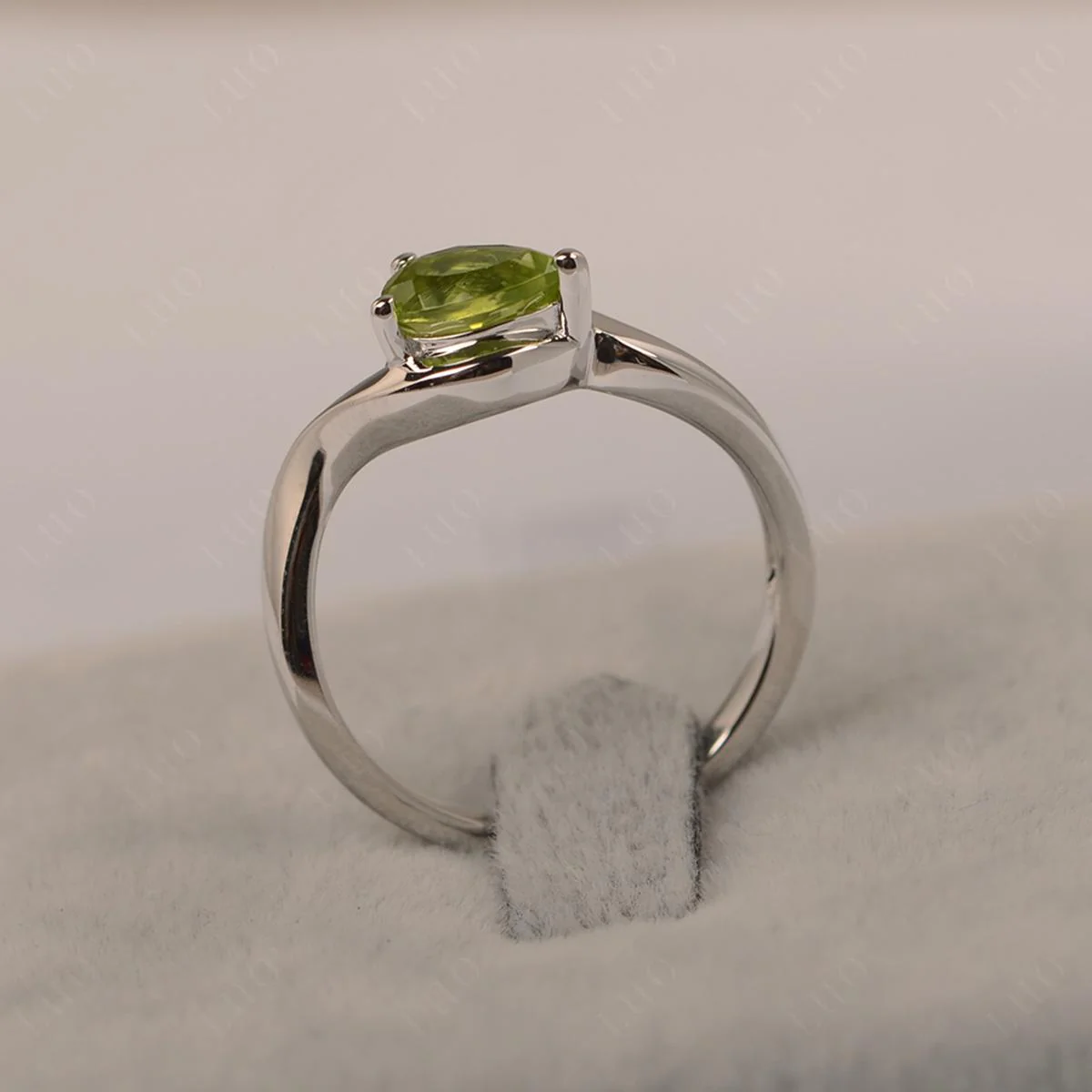 Pear Shaped Peridot East West Solitaire Ring - Image 11