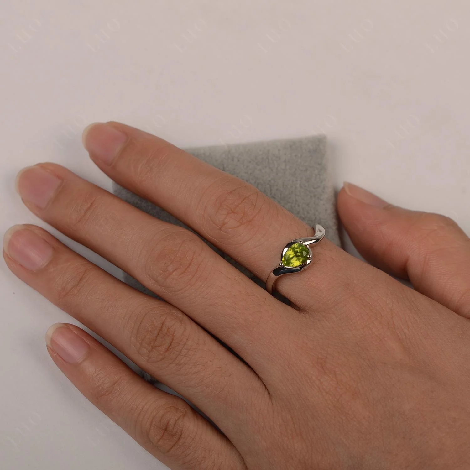 Pear Shaped Peridot East West Solitaire Ring - Image 12