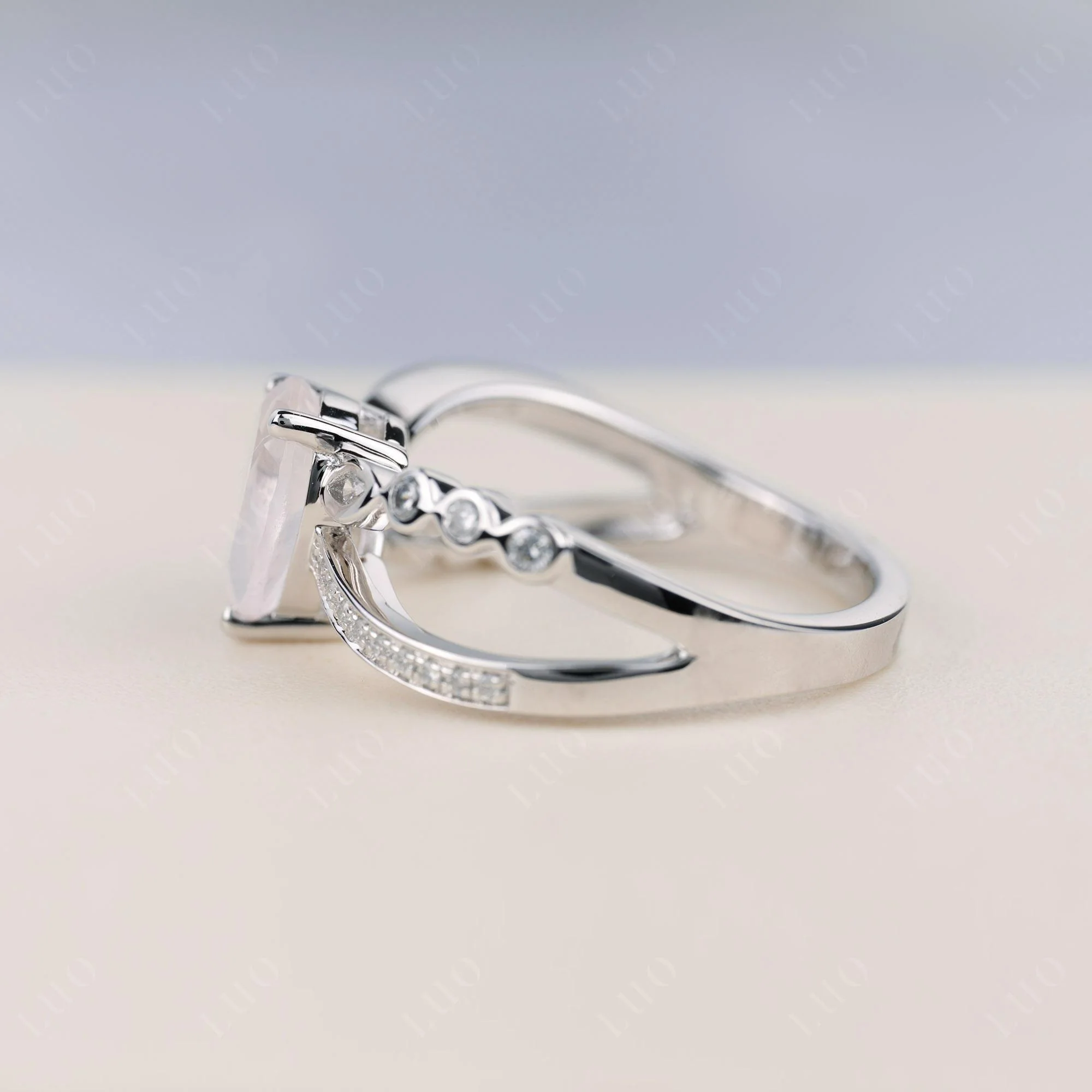 Pear Shaped Rose Quartz Crossover Ring - Image 3