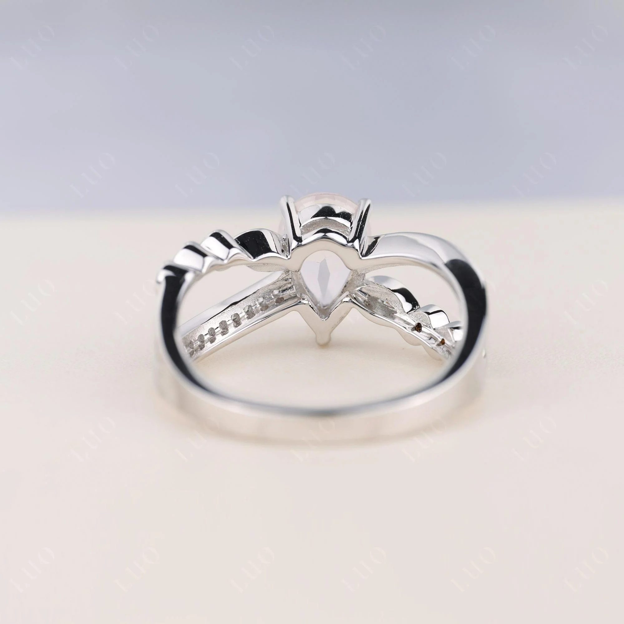 Pear Shaped Rose Quartz Crossover Ring - Image 4