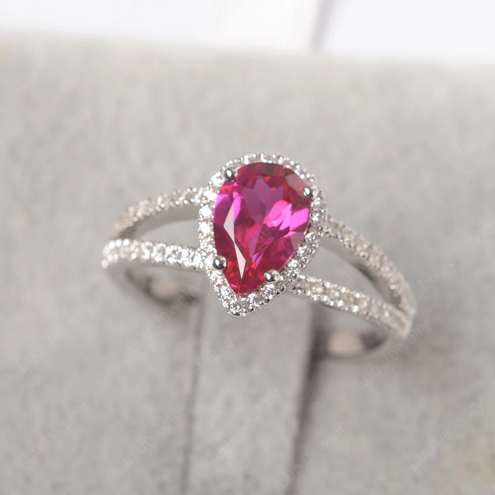 Pear Shaped Ruby Halo Split Shank Ring