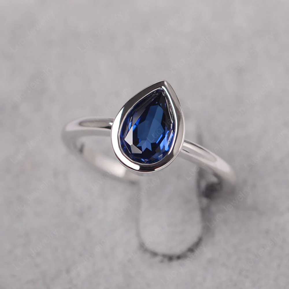 Pear Shaped Sapphire Bezel Set Ring