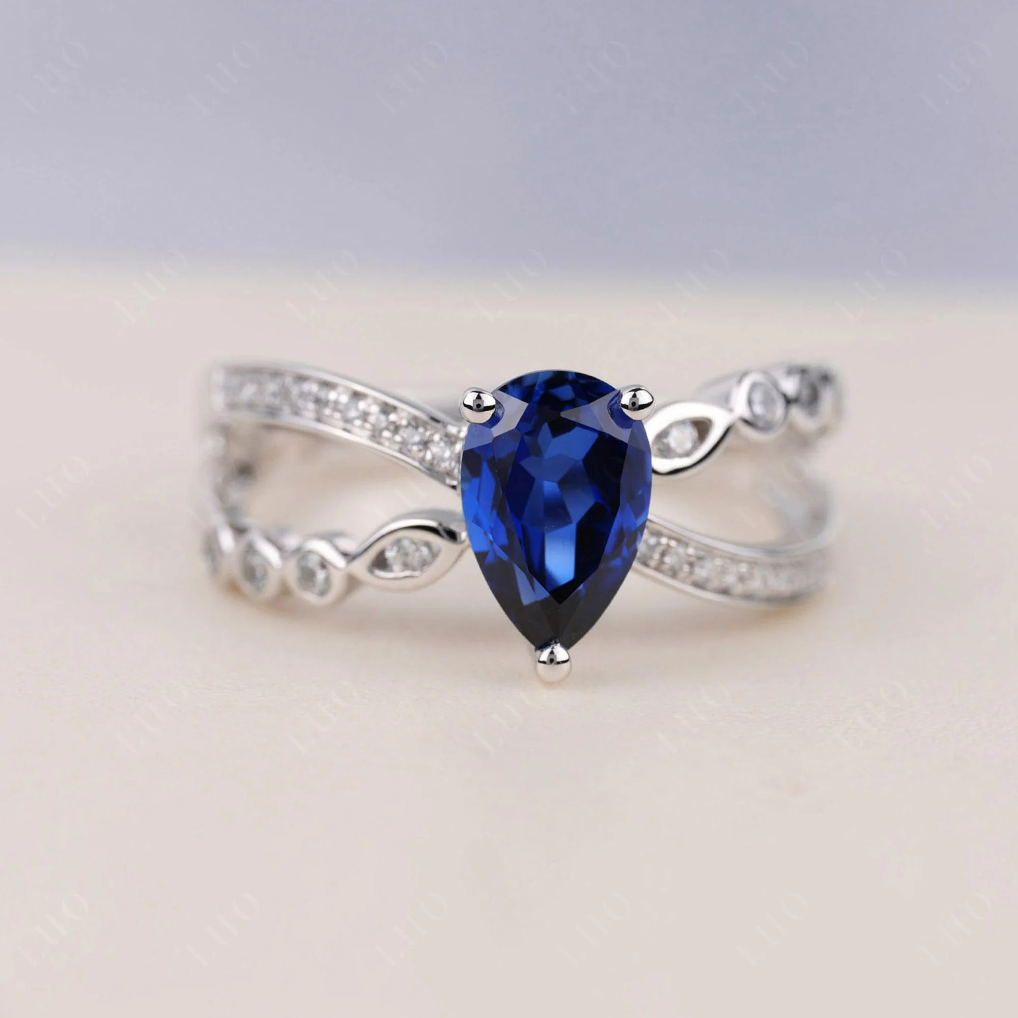 Pear Shaped Sapphire Crossover Ring