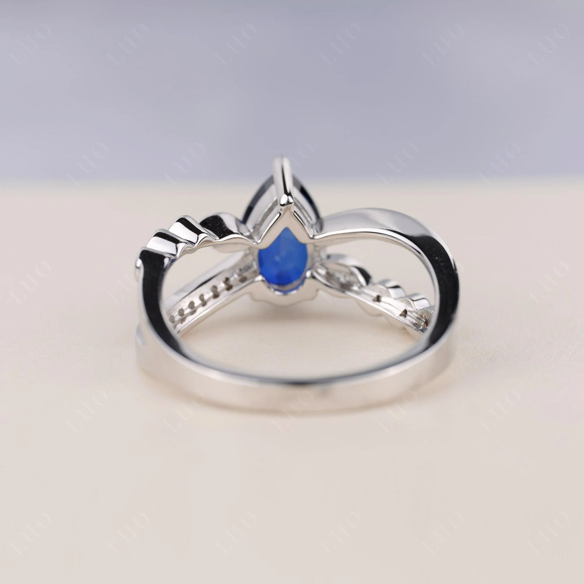 Pear Shaped Sapphire Crossover Ring - Image 4