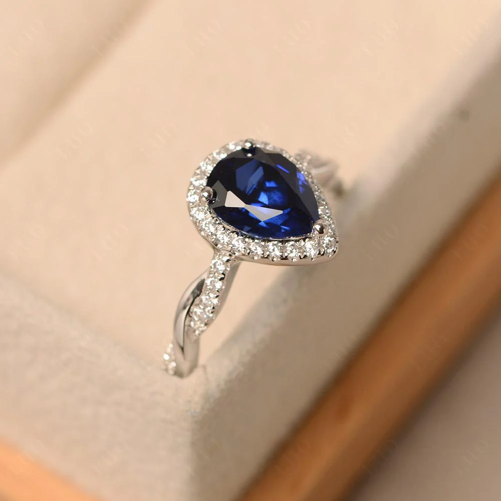 Pear Shaped Sapphire Twisted Halo Ring - Image 31