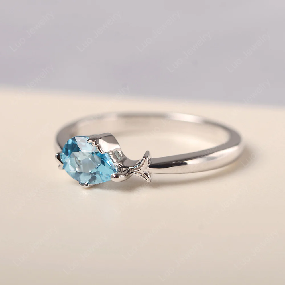 Pear Shaped Swiss Blue Topaz Fish Ring - Image 3
