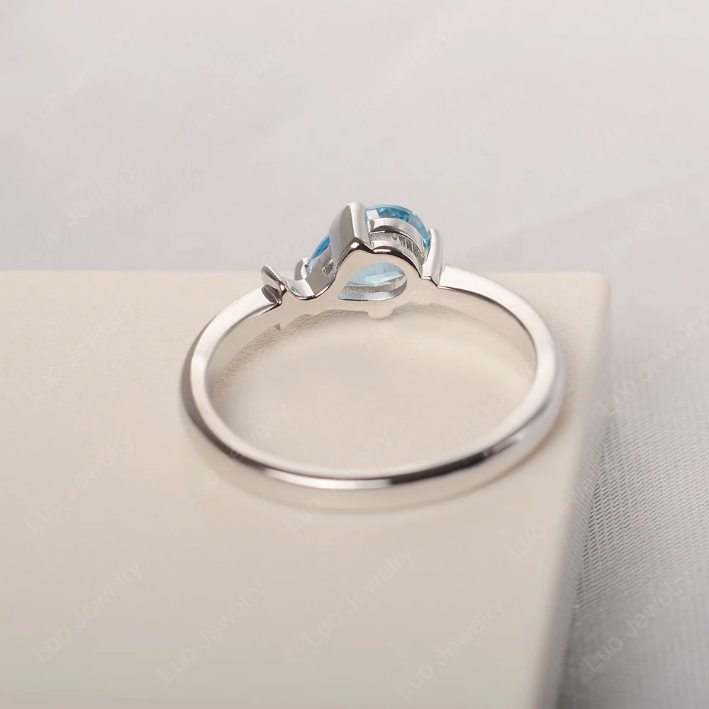 Pear Shaped Swiss Blue Topaz Fish Ring - Image 4