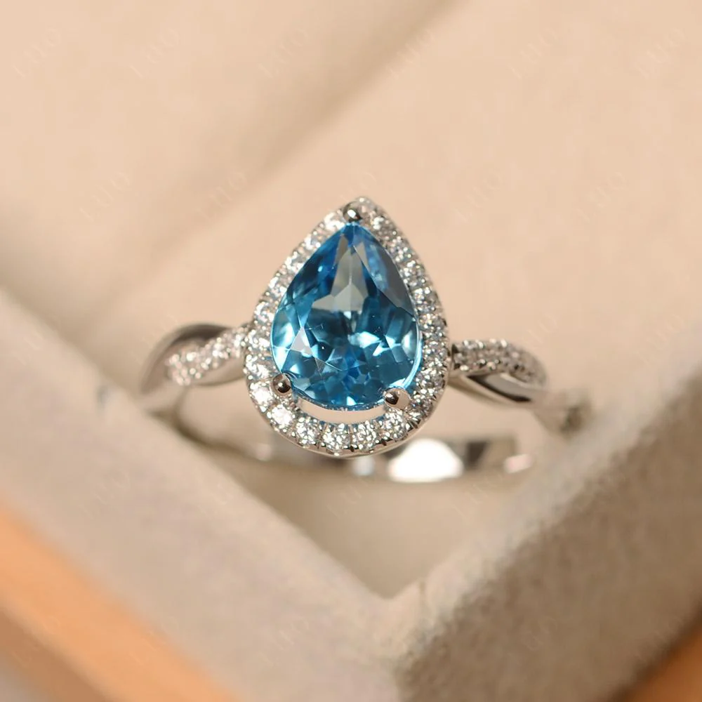 Swiss Blue Topaz Twisted Halo Engagement Ring - Image 29