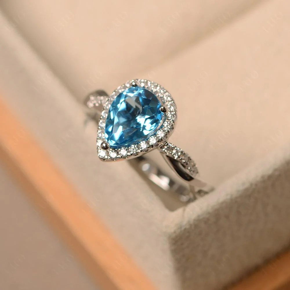 Swiss Blue Topaz Twisted Halo Engagement Ring - Image 30