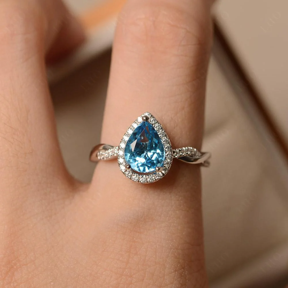 Swiss Blue Topaz Twisted Halo Engagement Ring - Image 33