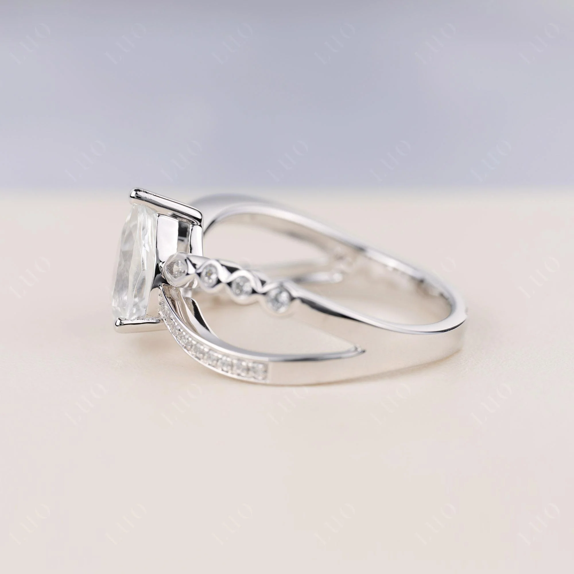 Pear Shaped White Topaz Crossover Ring - Image 3