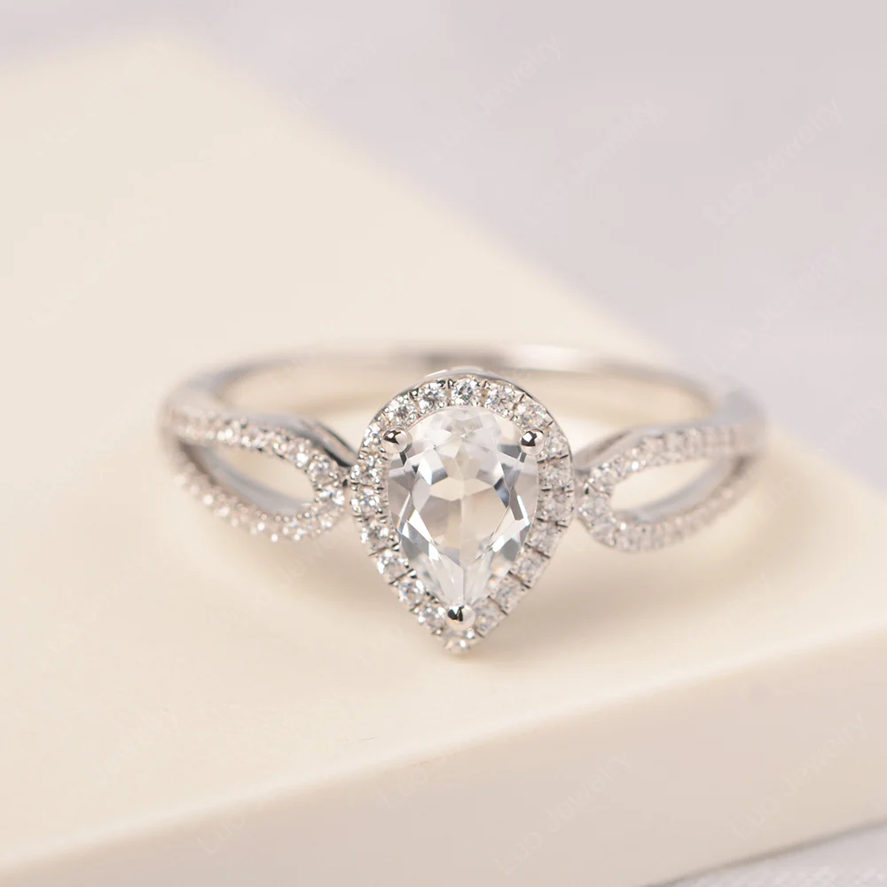 Pear Shaped White Topaz Halo Engagement Ring