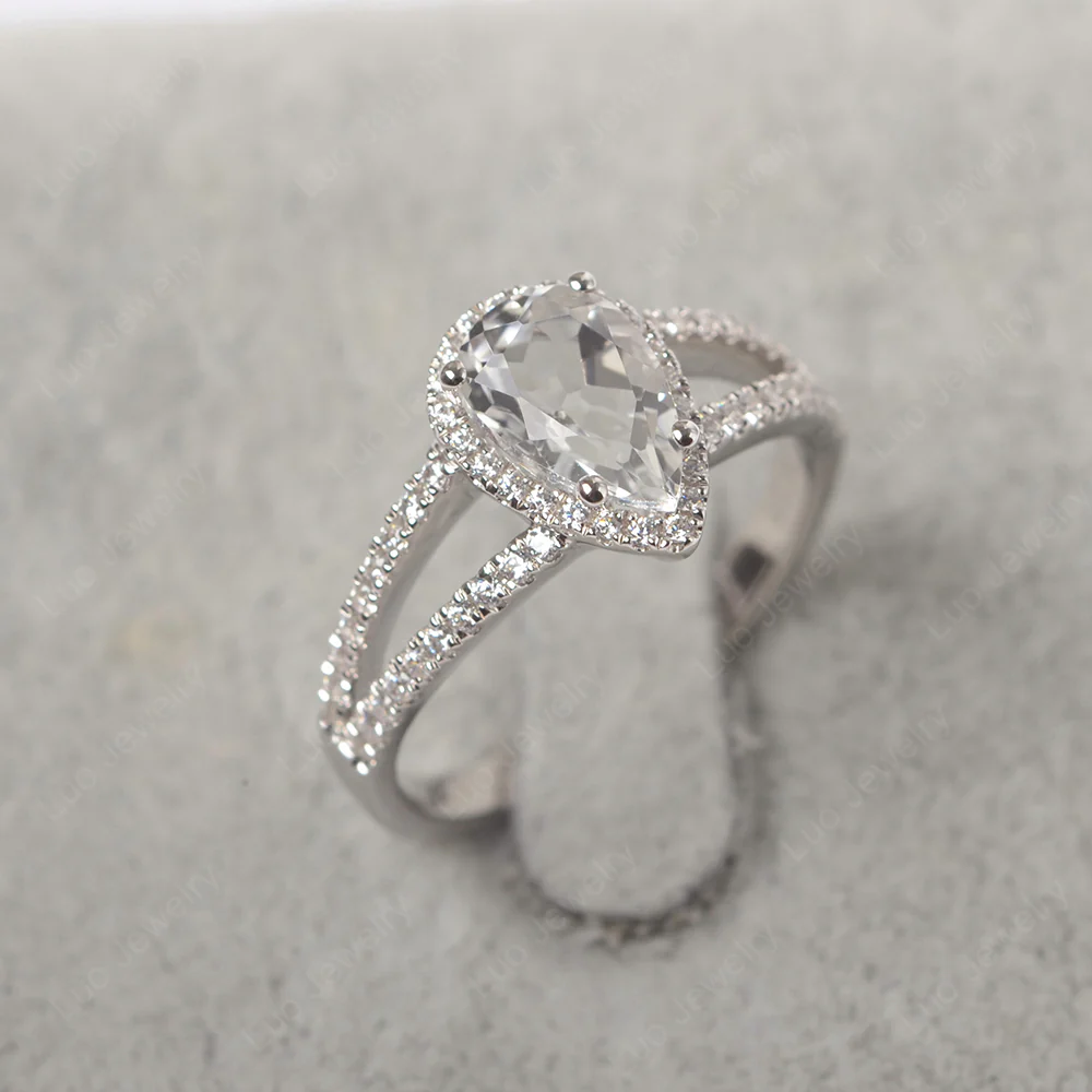 Pear Shaped White Topaz Halo Split Shank Ring - Image 2