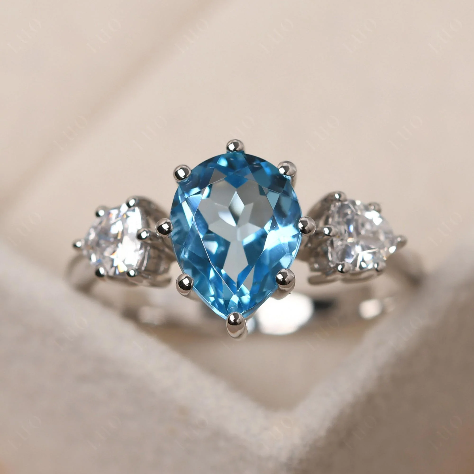 Pear Swiss Blue Topaz Ring with Trillion Side Stone - Image 29