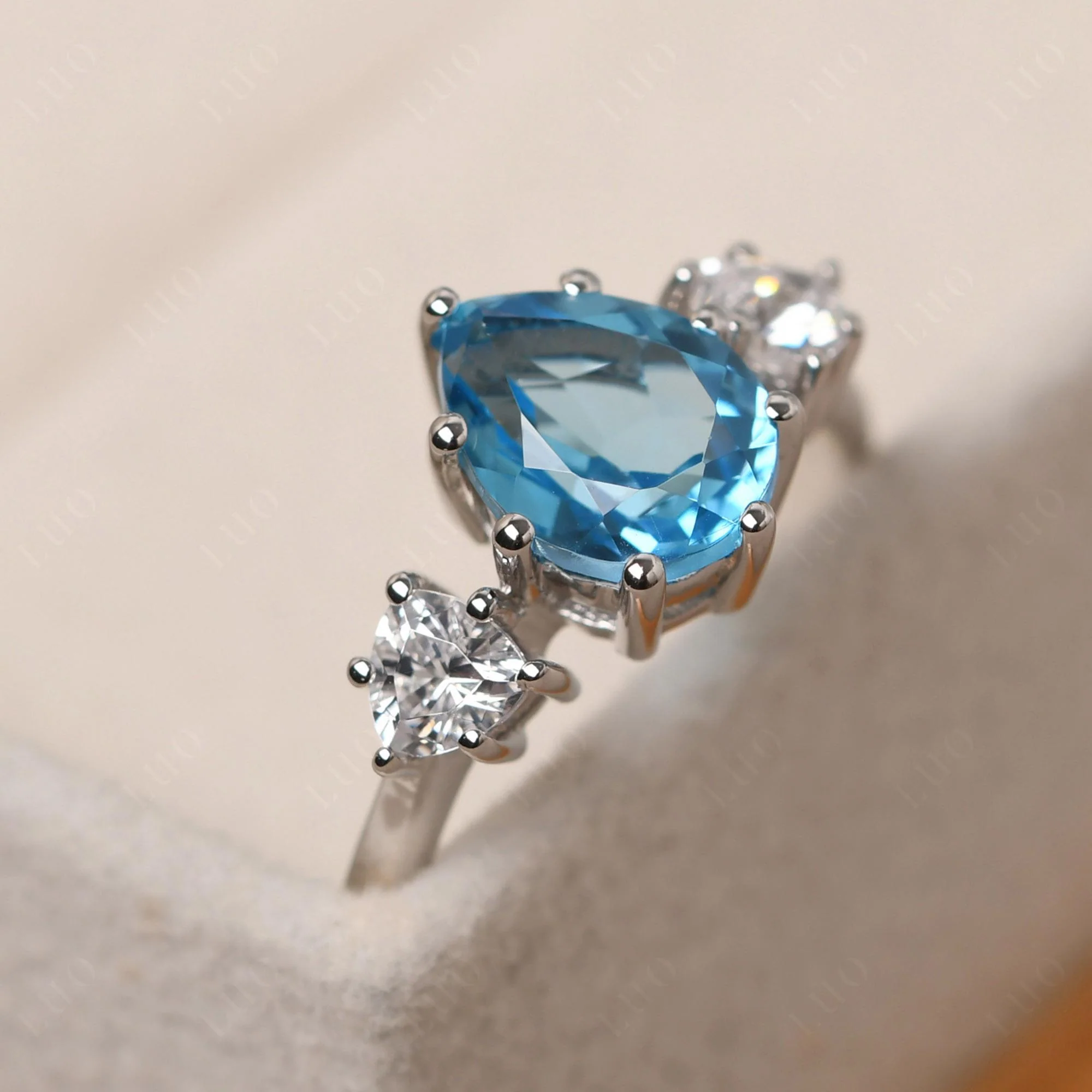 Pear Swiss Blue Topaz Ring with Trillion Side Stone - Image 30