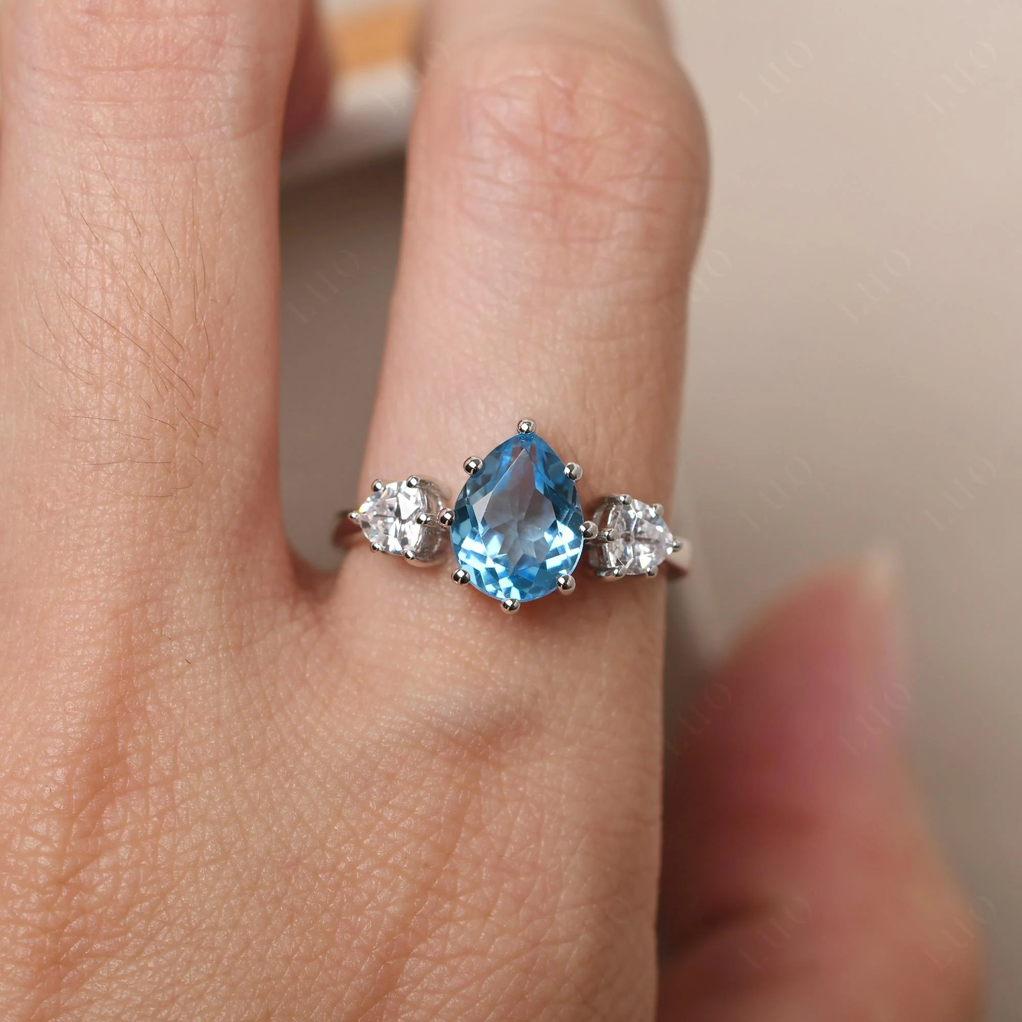 Pear Swiss Blue Topaz Ring with Trillion Side Stone - Image 34