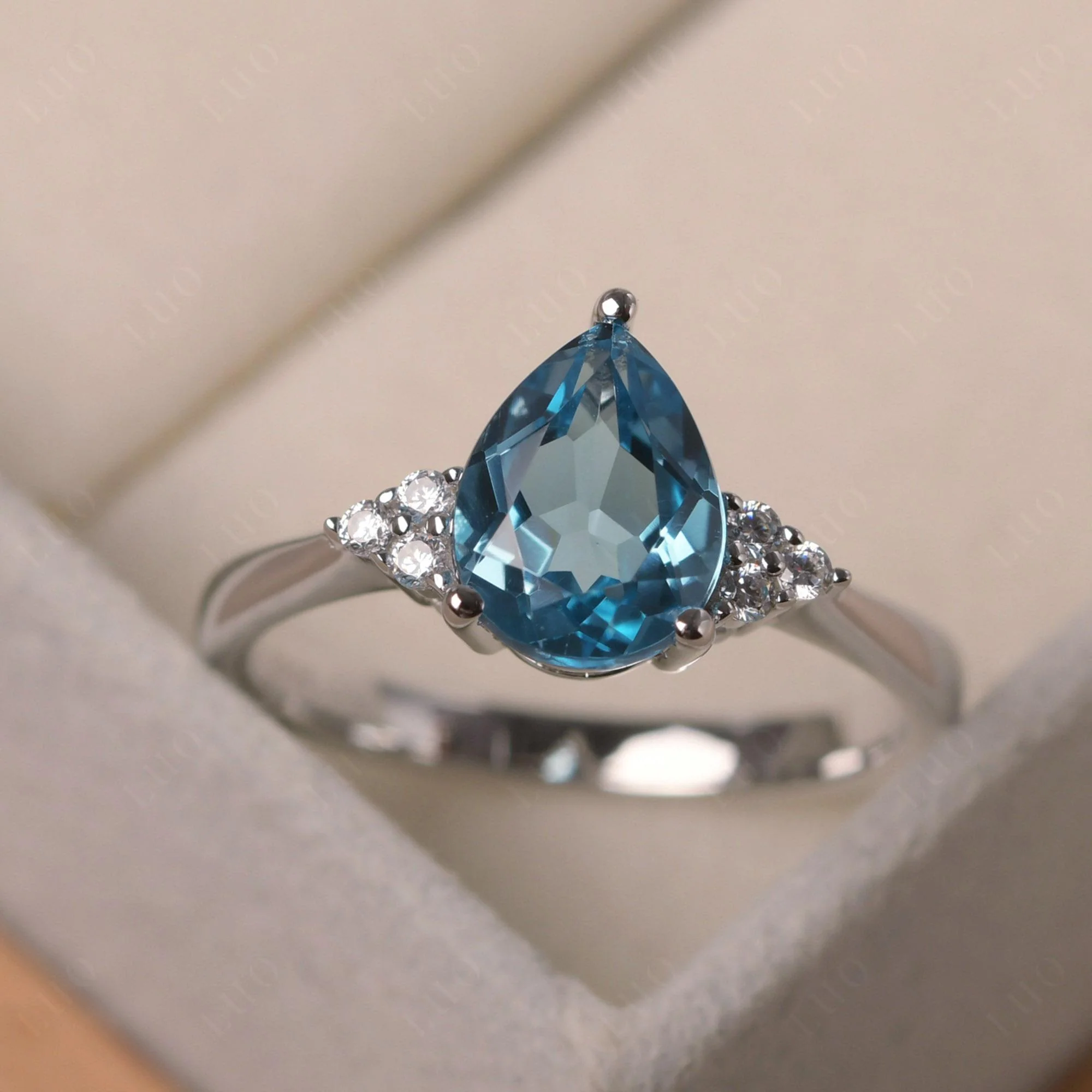 Pear Shaped Swiss Blue Topaz Promise Ring