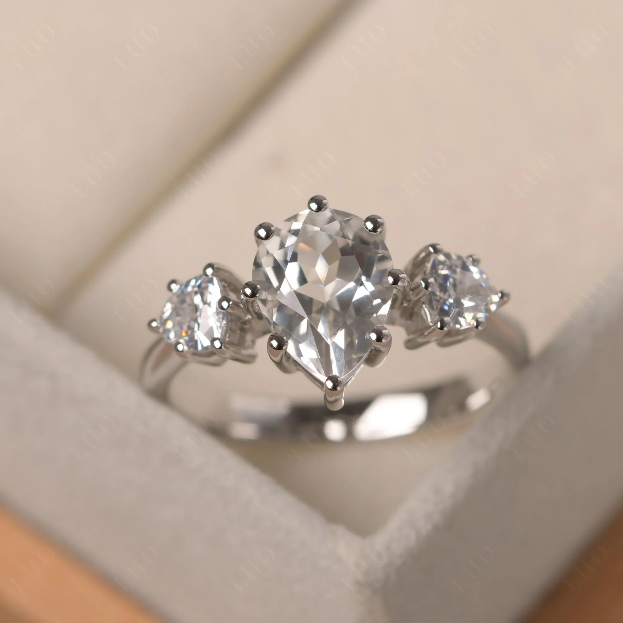 Pear White Topaz Ring with Trillion Side Stone - Image 29