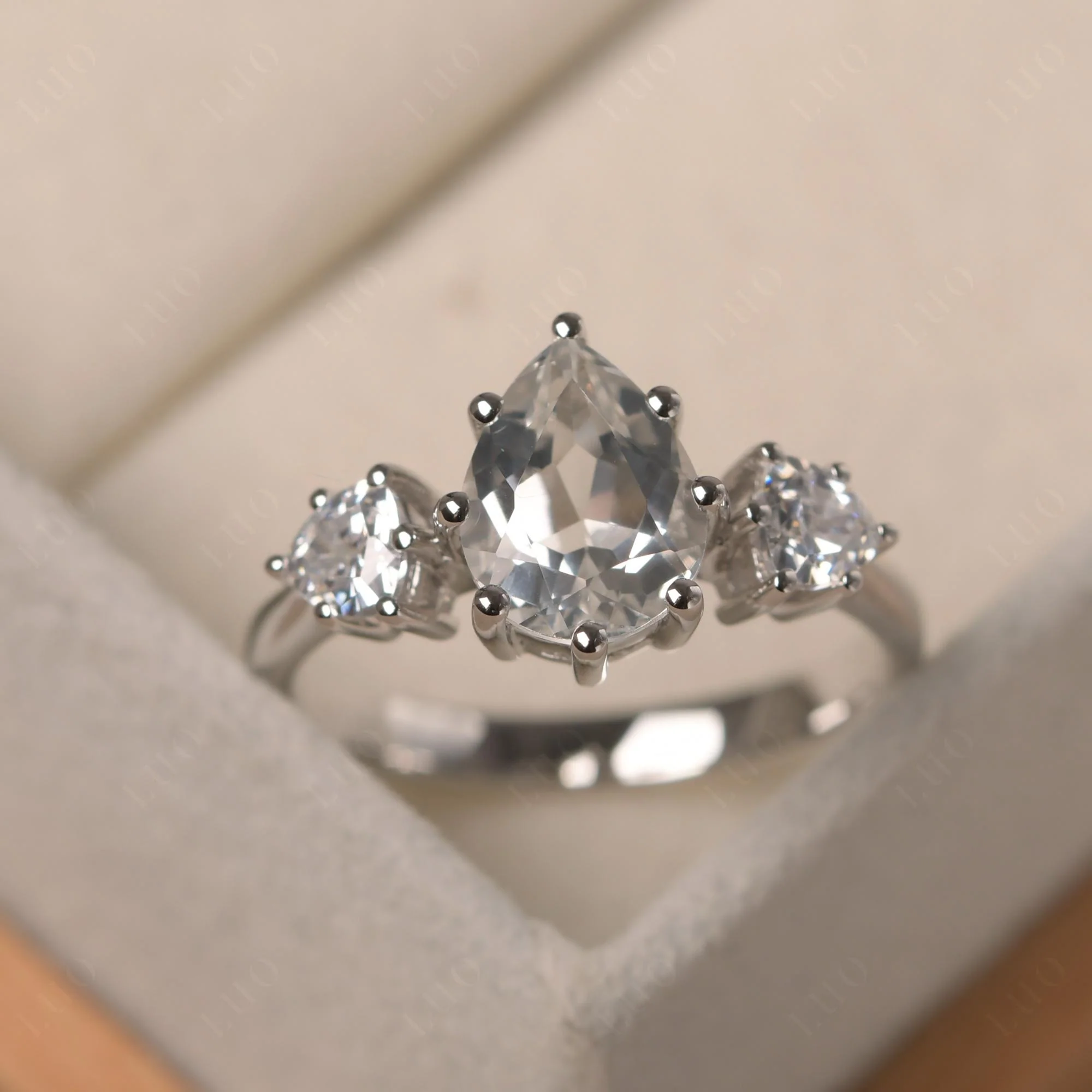 Pear White Topaz Ring with Trillion Side Stone - Image 30