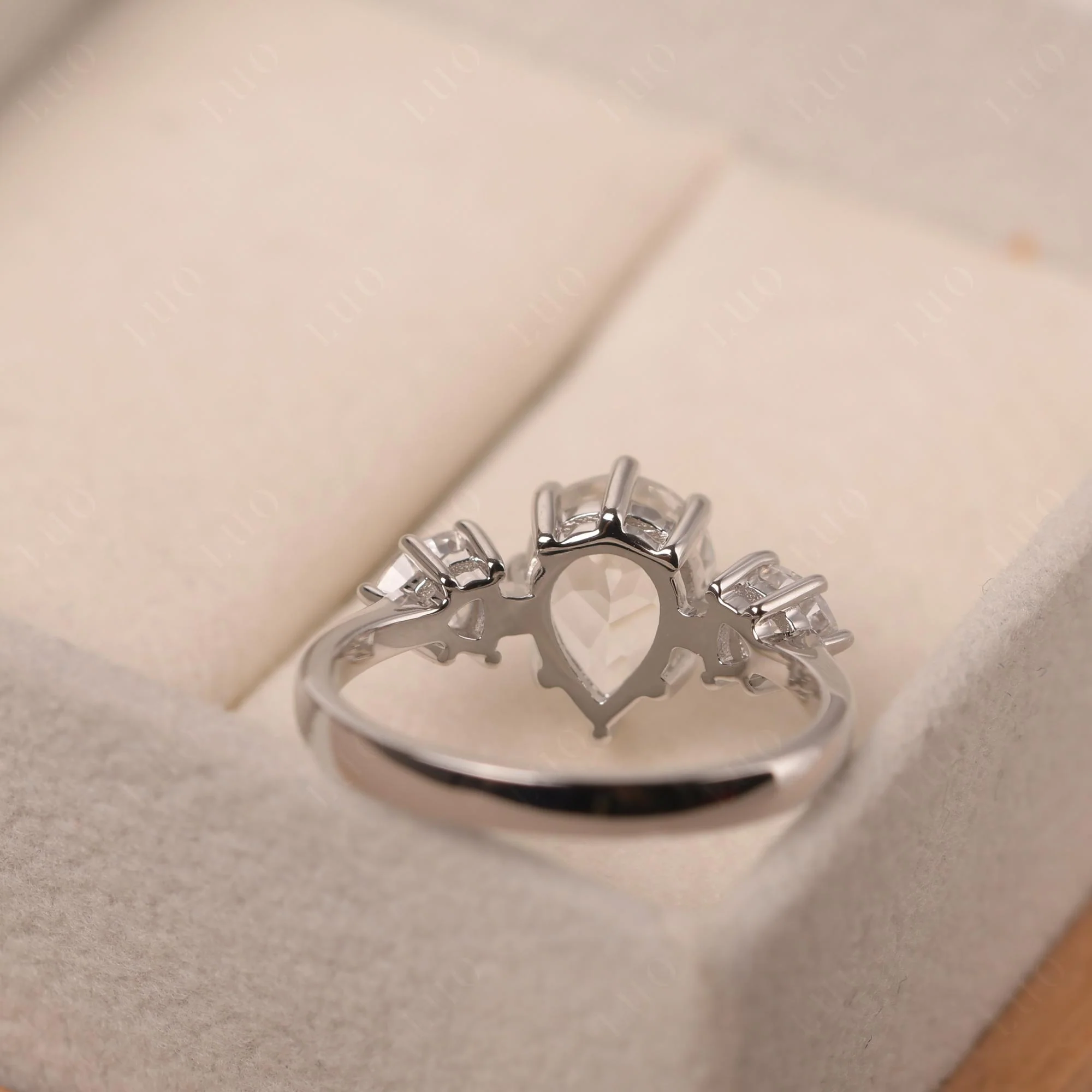 Pear White Topaz Ring with Trillion Side Stone - Image 32