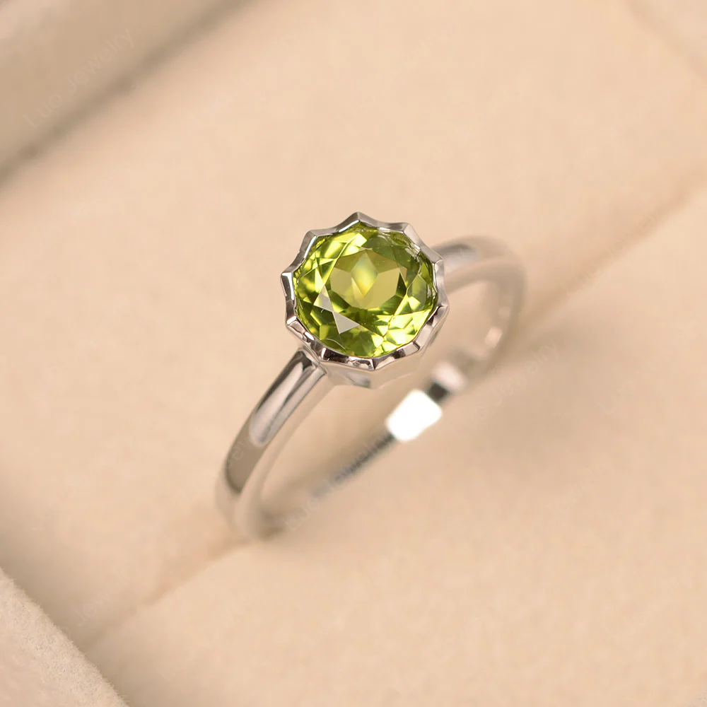 Peridot Bezel Solitaire Decagon Ring - Image 3
