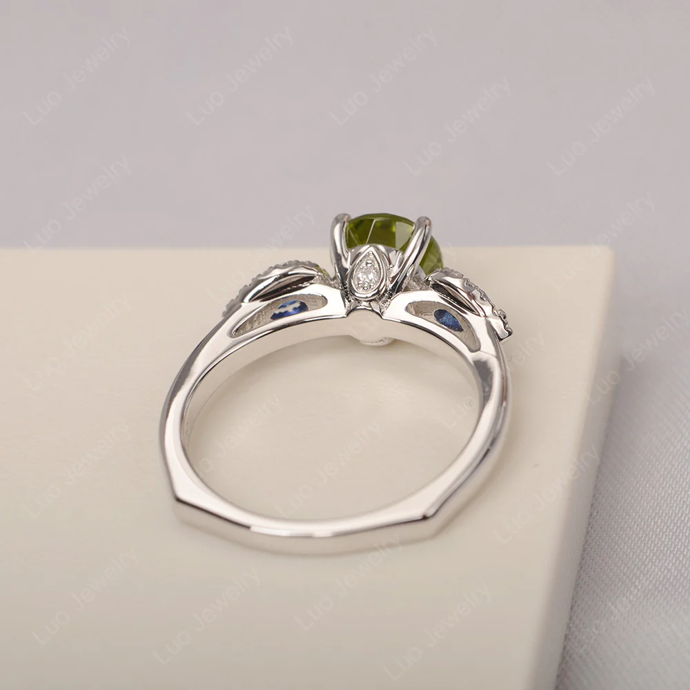 Euro Shank Peridot and Sapphire Ring - Image 3