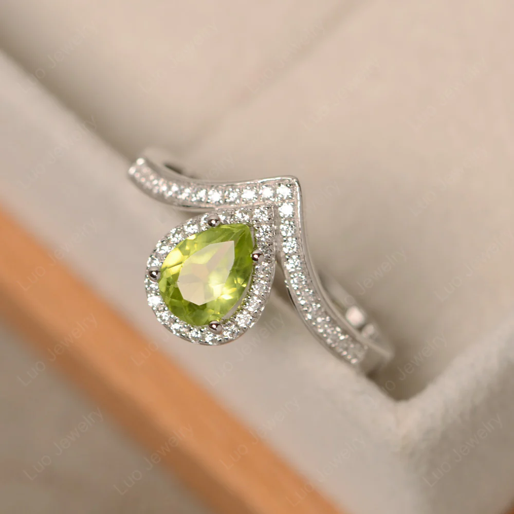 Teardrop Shaped Peridot Chevron Ring - Image 2