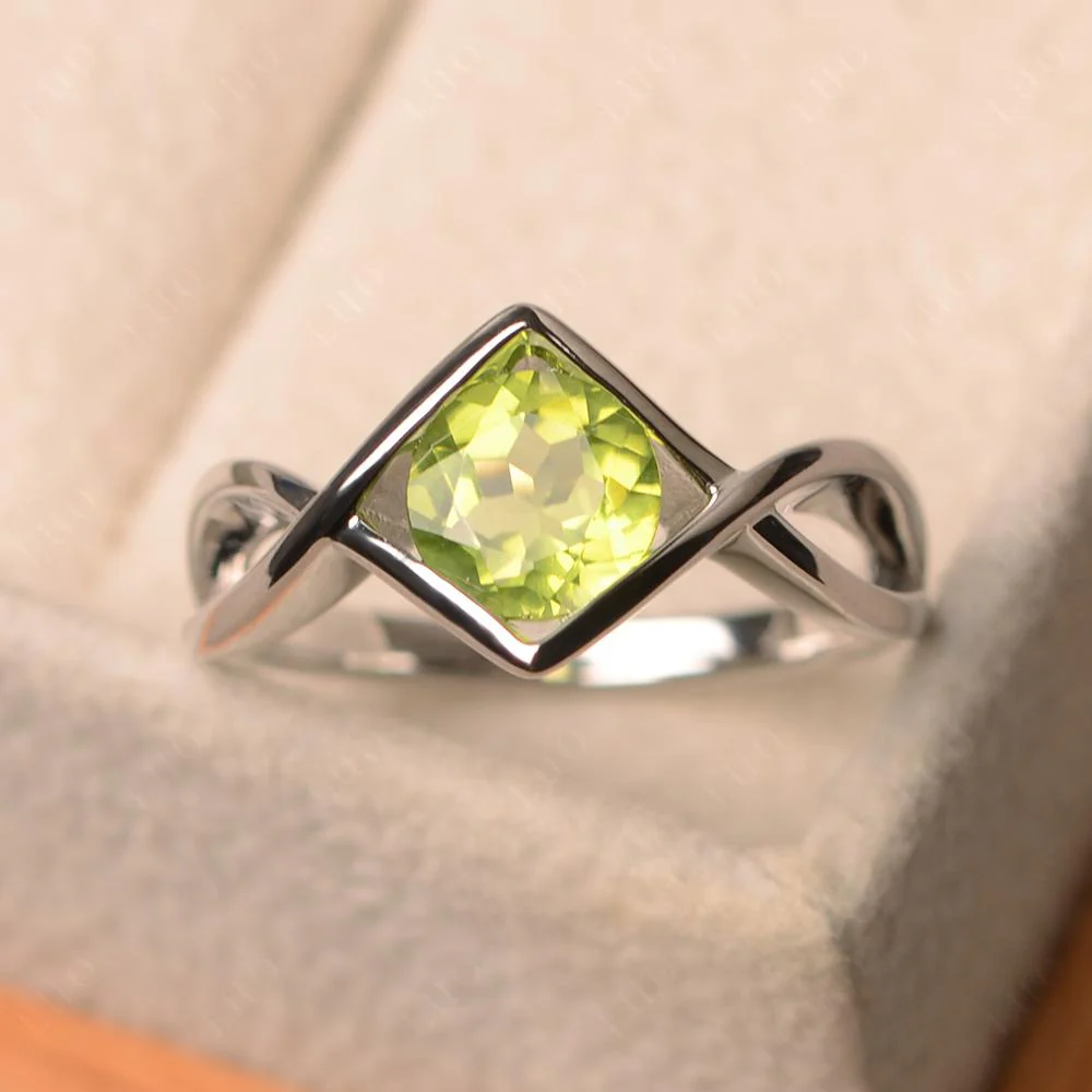 Peridot Bezel Set Infinity Solitaire Ring - Image 10