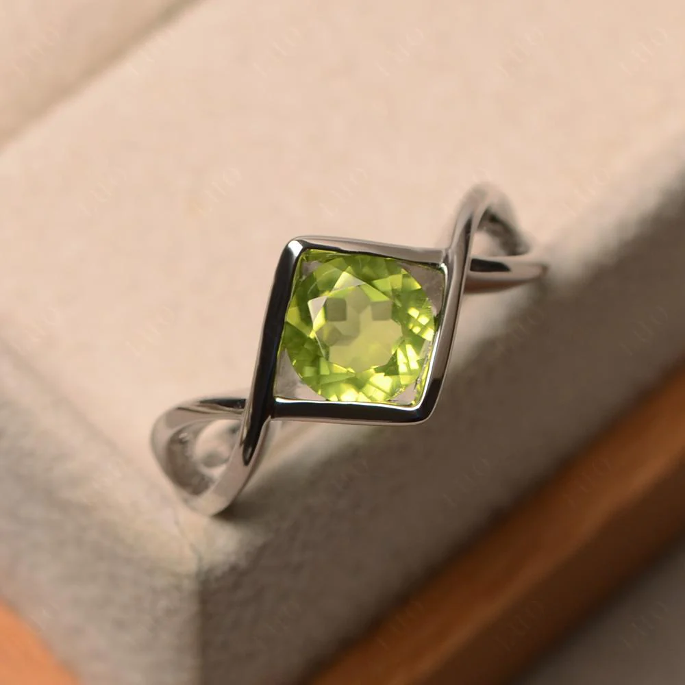Peridot Bezel Set Infinity Solitaire Ring - Image 11
