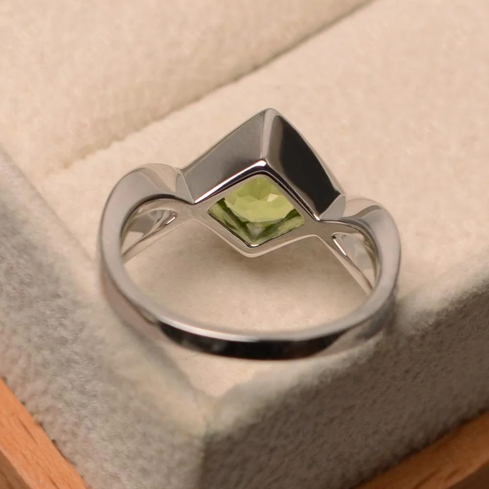Peridot Bezel Set Infinity Solitaire Ring - Image 12