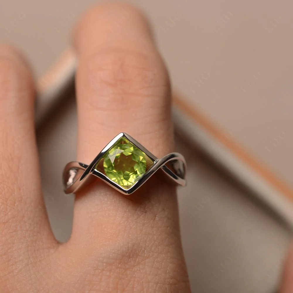 Peridot Bezel Set Infinity Solitaire Ring - Image 13