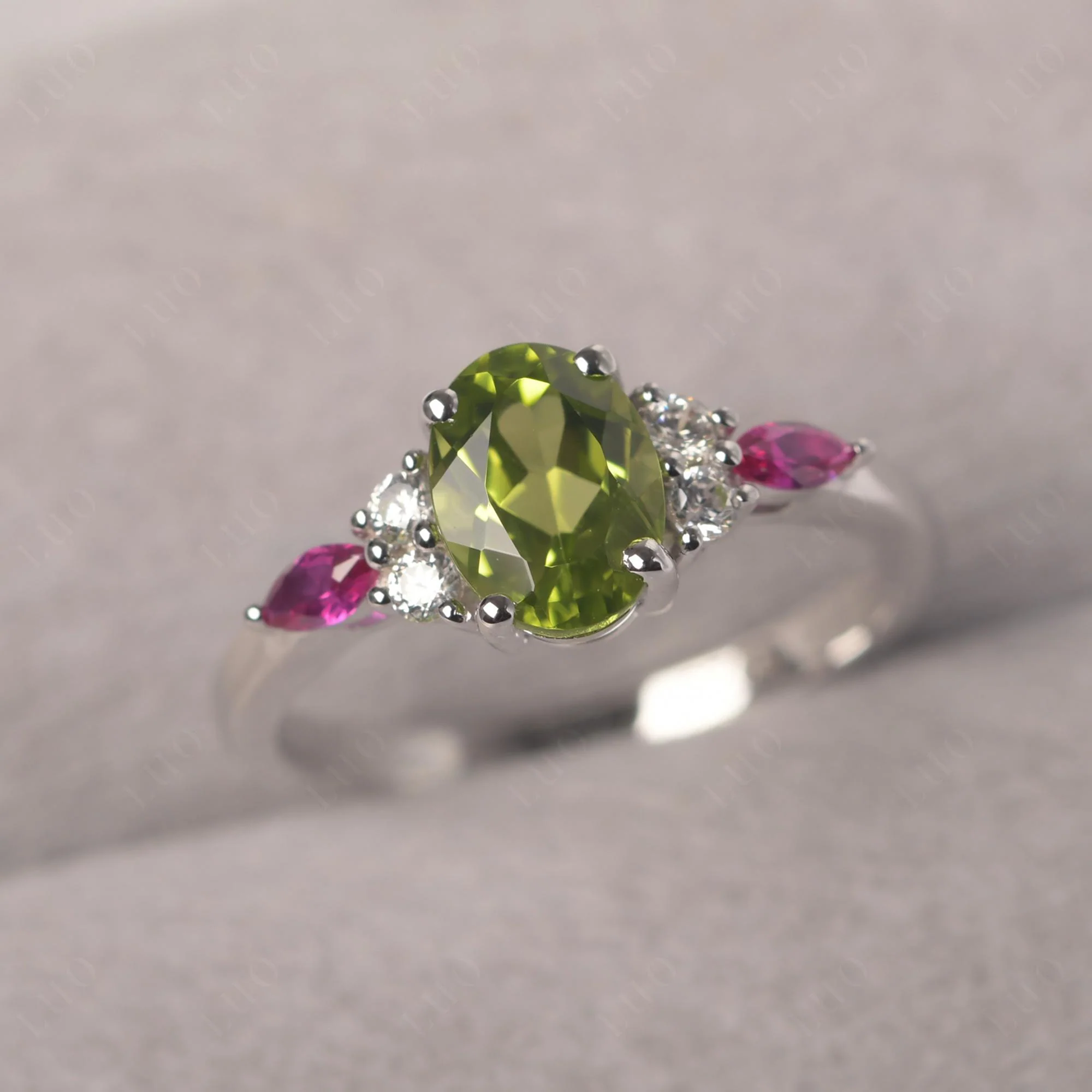 Simple Oval Peridot Engagement Ring - Image 29