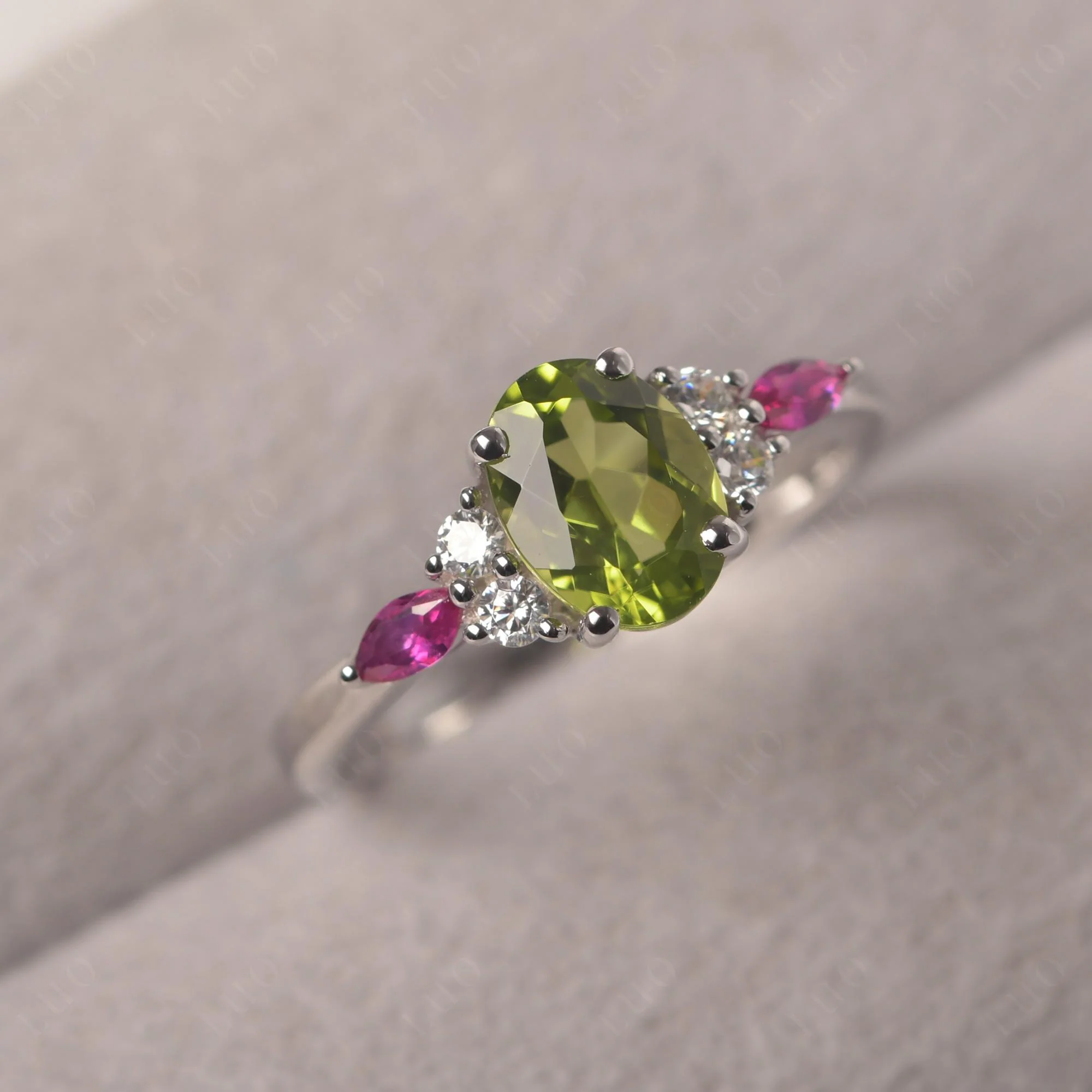 Simple Oval Peridot Engagement Ring - Image 30