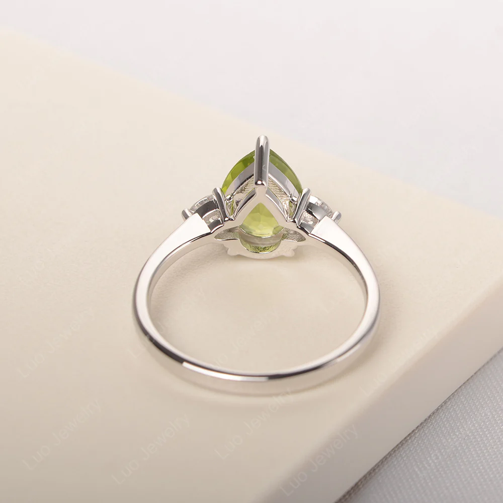 Teardrop Peridot Trilogy Ring - Image 3