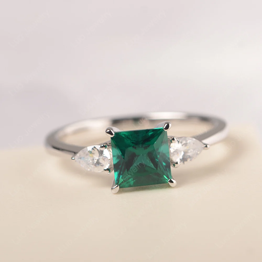 Princess Cut Emerald Ring with Pear Side Stone