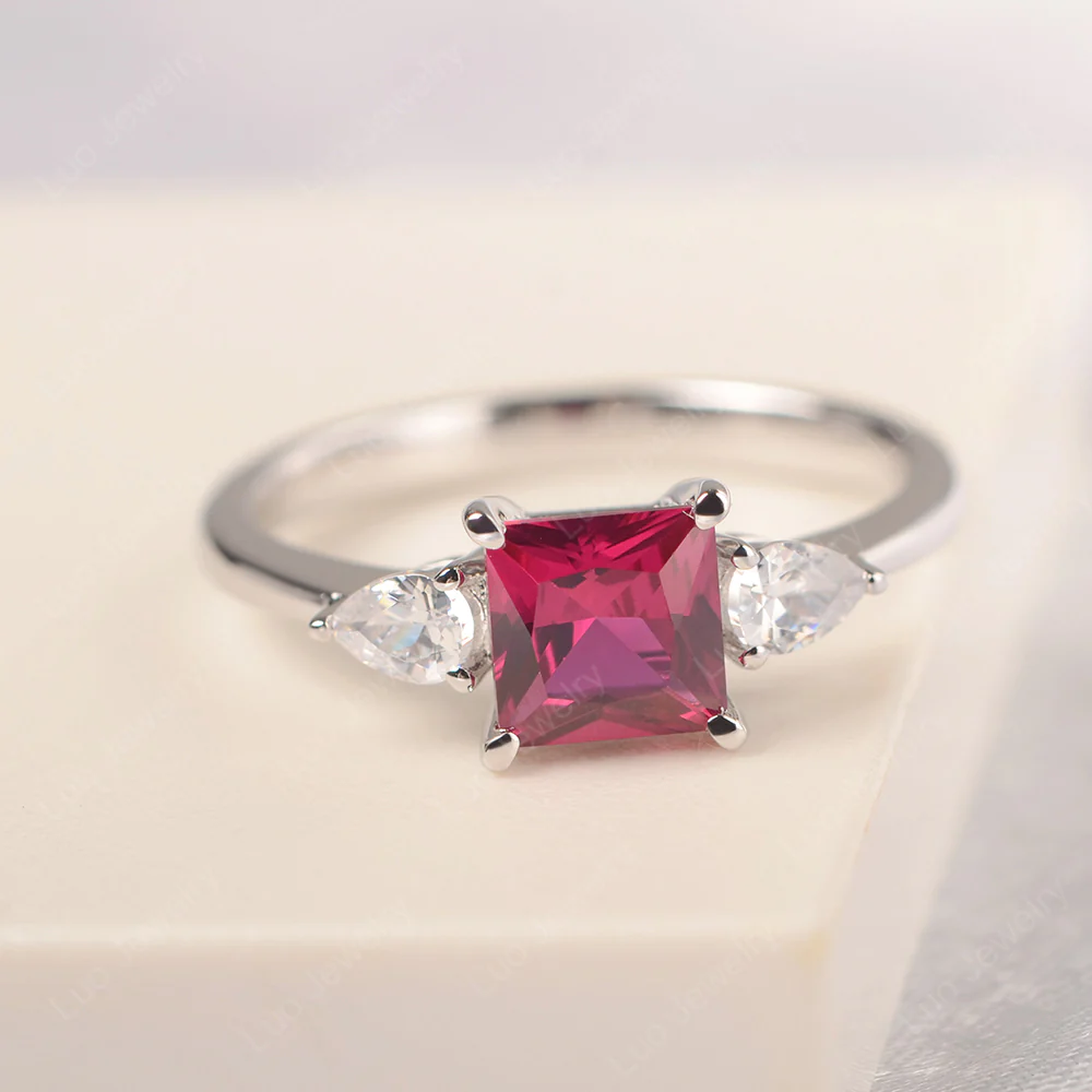Princess Cut Ruby Ring with Pear Side Stone