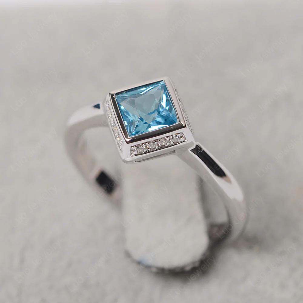 Swiss Blue Topaz Bezel Halo Engagement Ring - Image 2