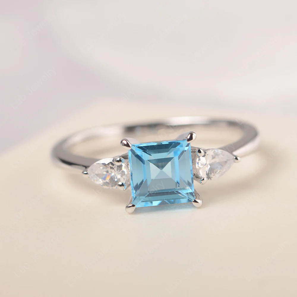 Square Cut Swiss Blue Topaz Ring with Pear Side Stone