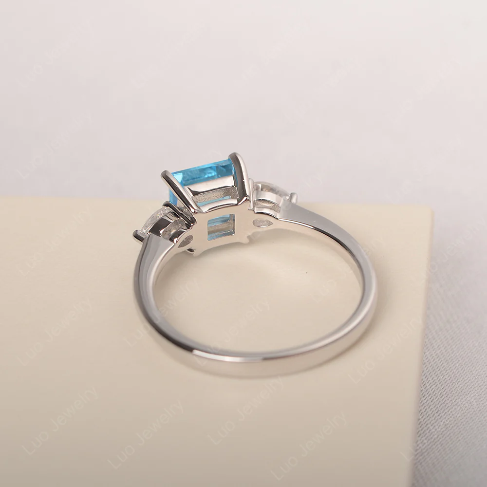 Square Cut Swiss Blue Topaz Ring with Pear Side Stone - Image 3