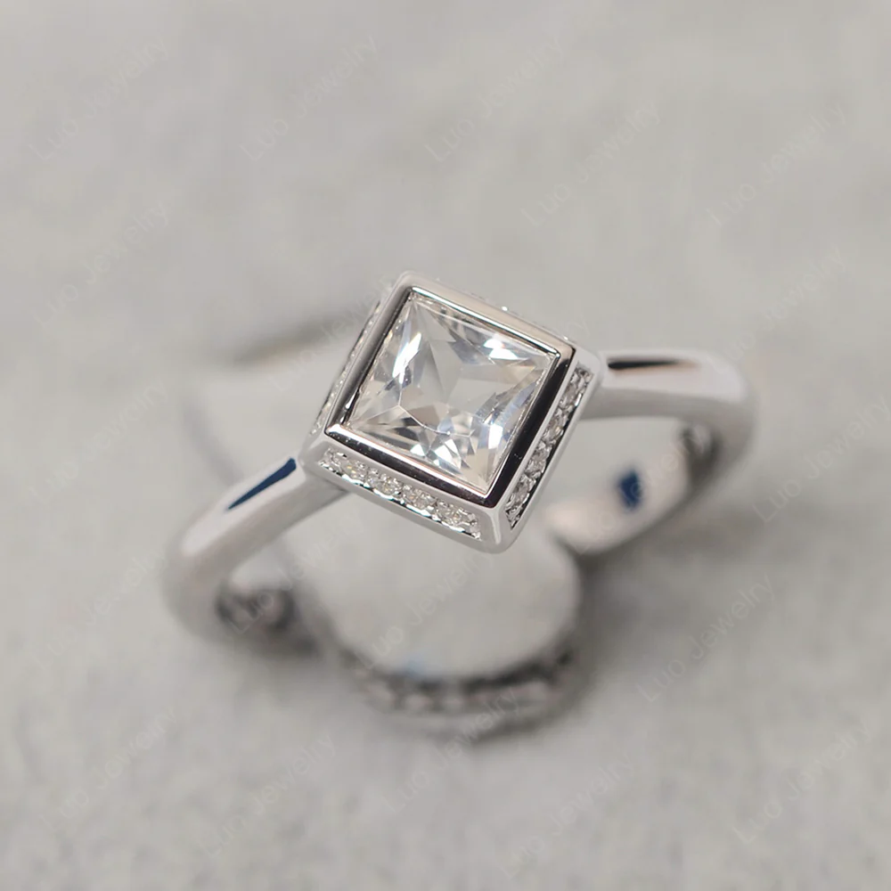 White Topaz Bezel Halo Engagement Ring