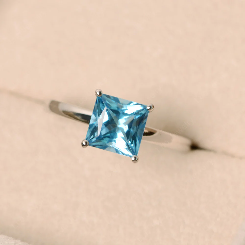 Swiss Blue Topaz Minimal Engagement Ring - Image 3