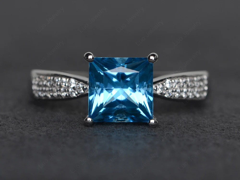 Swiss Blue Topaz Ring with Two Pave Row