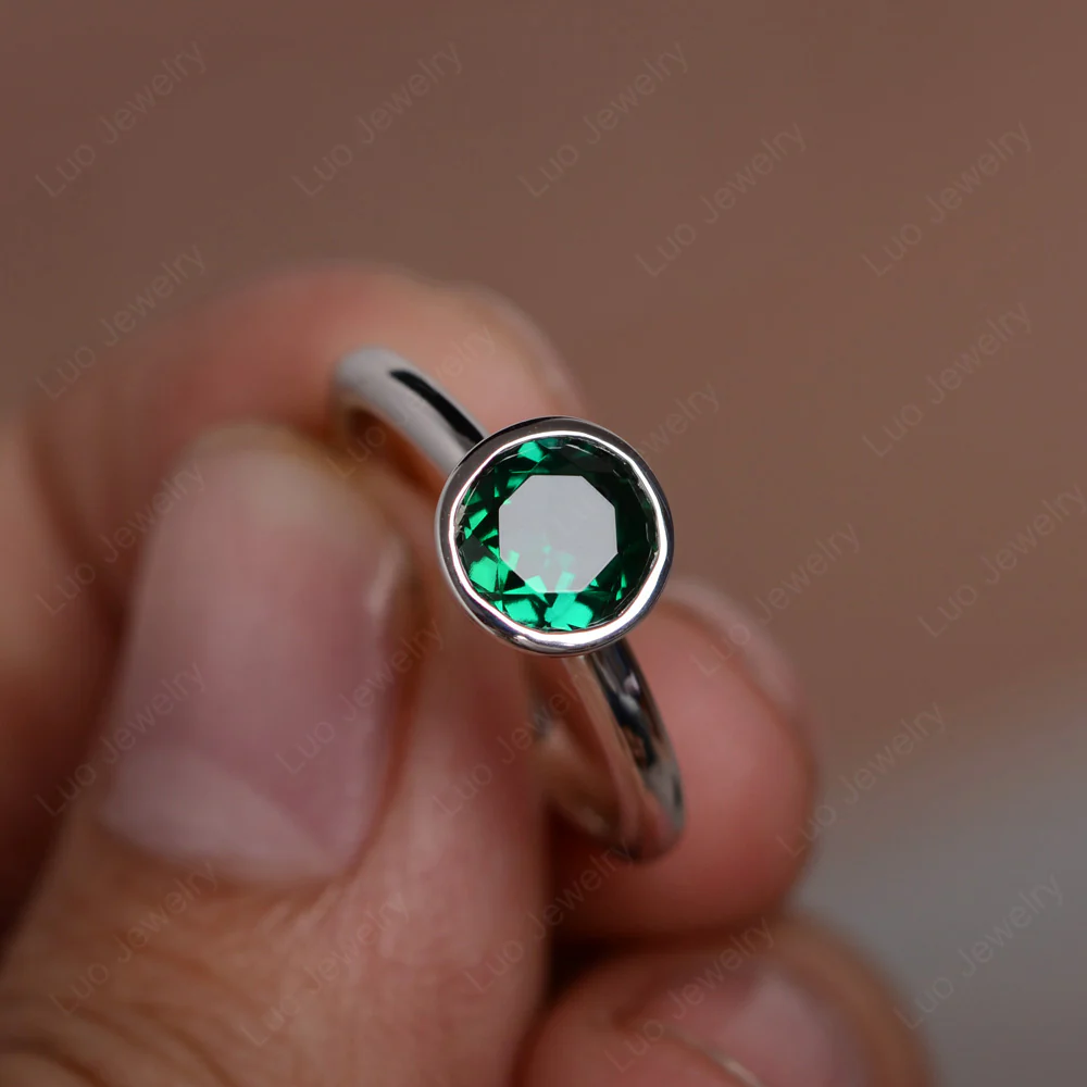 Round Emerald Bezel Set Engagement Ring