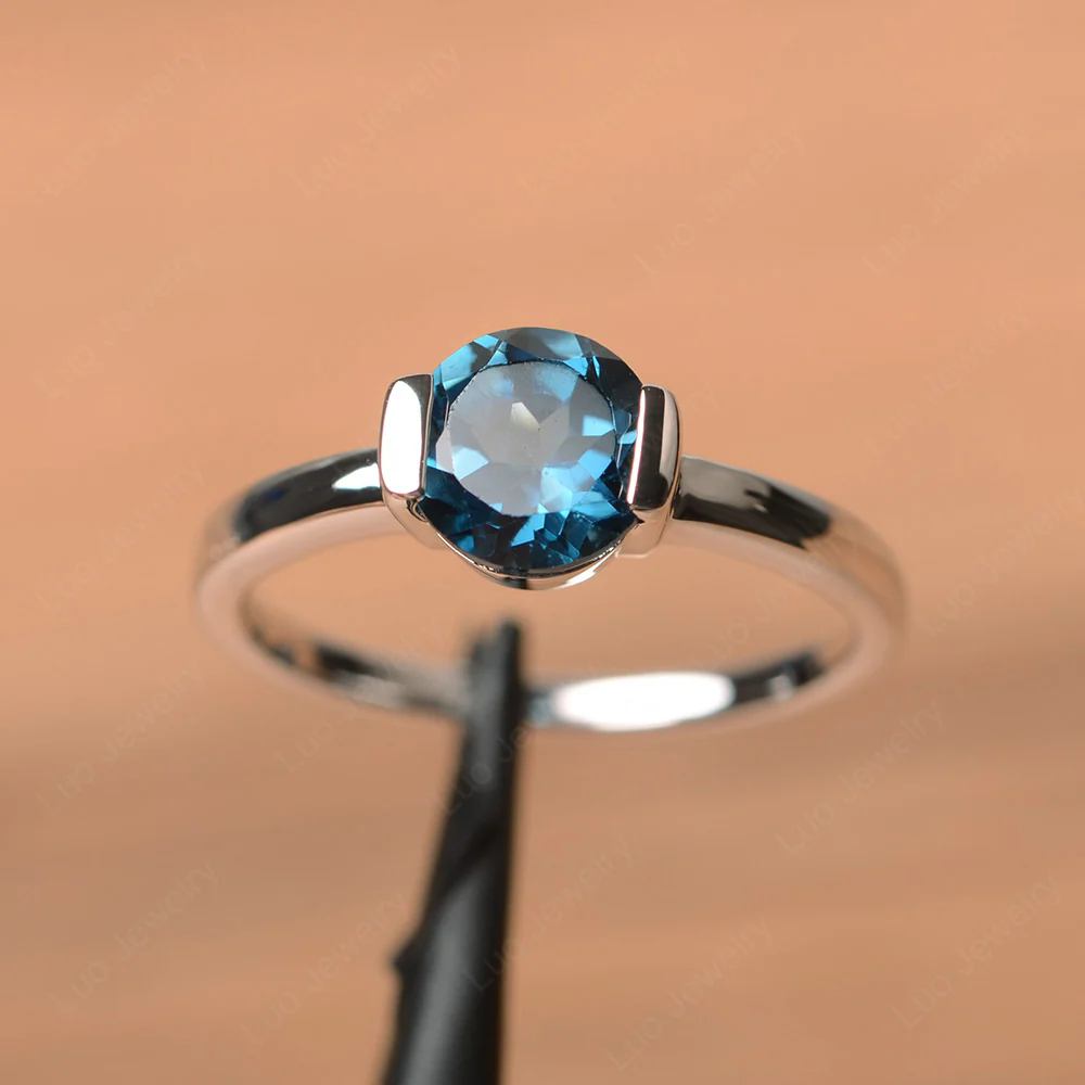 Round Cut London Blue Topaz Solitaire Bezel Ring