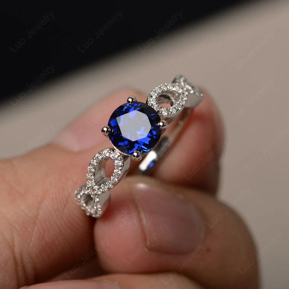 Sapphire Infinity Promise Rings